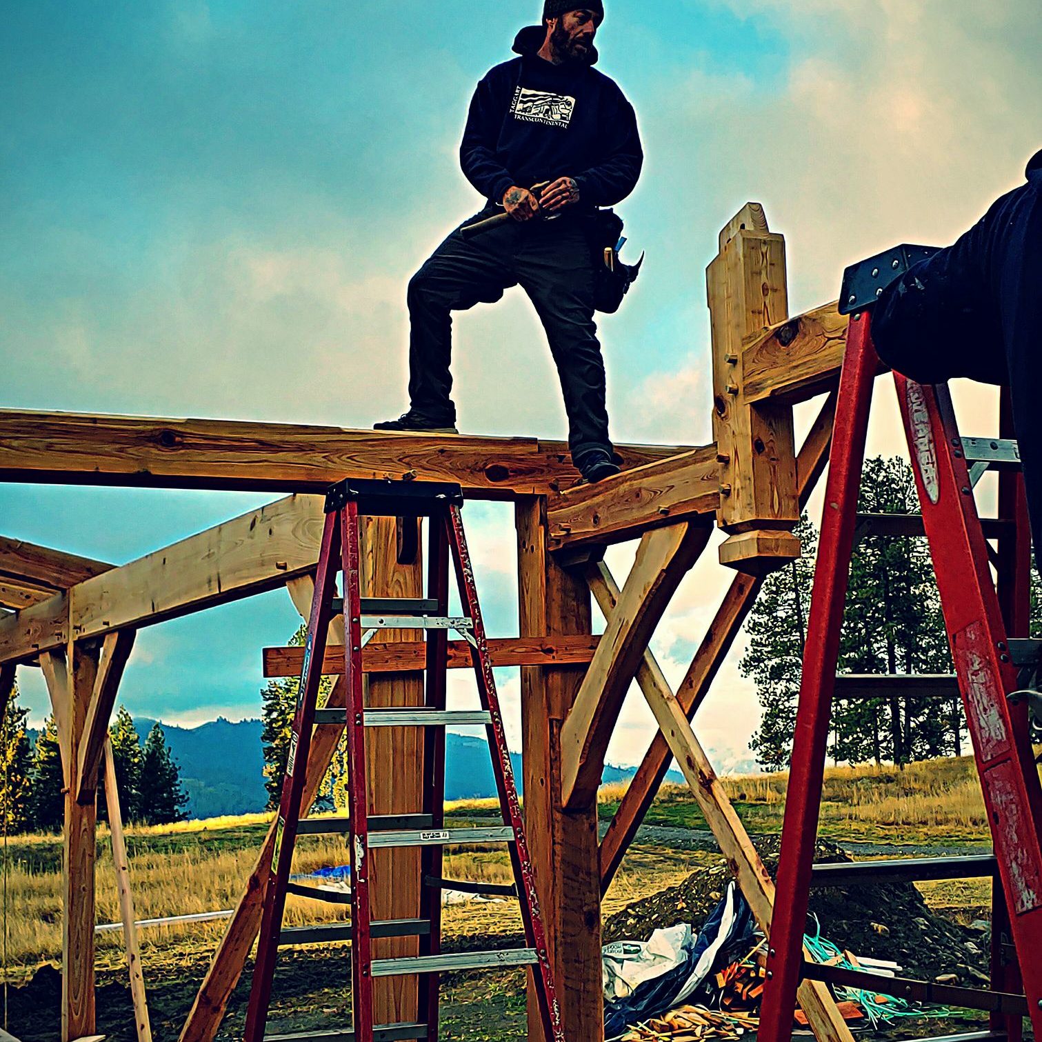 Jeremy Ford Working on Lake Roosevelt Home Beams